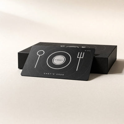TableGlow Chef's Card leaning on the black gift box – front view